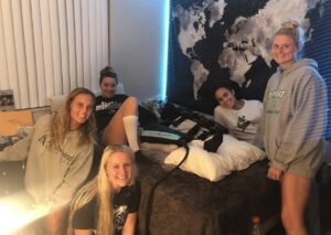 Hailey recovering with her friends after surgery. 